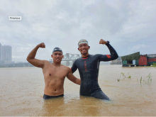 Image: Two Vietnamese athletes make record as swimming over 200km in cold river water
