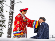 Image: Vietnamese Polish couple wearing Nguyen Dynasty costume for snowy wedding pictures in Canada