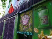 Image: Artist paints murals on house to raise awareness of COVID-19 prevention in Hanoi