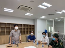 Image: Medical officials suspended from work after Vietnamese returnee spread COVID-19
