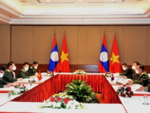 Image: Vietnam Laos discuss to promote mutual support and cooperation for defense