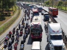 Image: The roads to Ho Chi Minh City and Hanoi are stuck