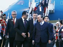 Image: President Phuc begins State visit to Indonesia