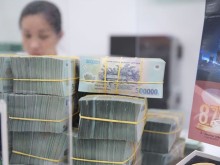 Image: Vietnam’s central bank cuts interest rates
