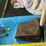 Photos Found in Soldier's Grave in Lam Dong