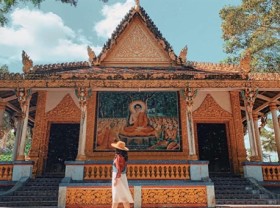 Image: Bat Pagoda,  home of thousands of bats in Mekong Delta