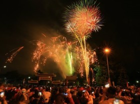 Image: People flock to the streets in major cities to celebrate New Year