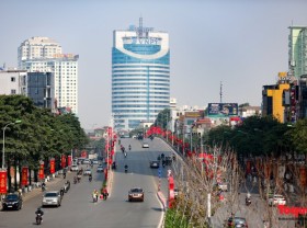 Image: Flamboyant flower flags welcome the XIII Party Congress