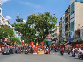 Image: Young people check-in the Tet decoration street