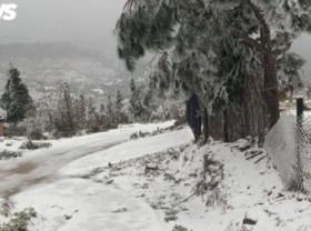 Image: White snow transforms Y Ty Commune into European-style village