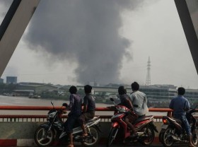 Image: Chinese factories set on fire in Myanmar s deadliest day since coup