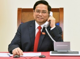 Image: Cambodian PM congratulates new Vietnamese PM via phone talks