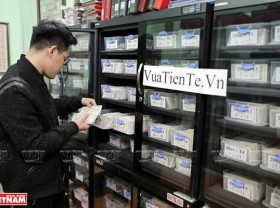 Image: Young man with a passion for collecting old currency