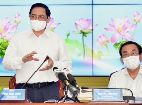 Image: PM holds working session with Ho Chi Minh City officials