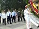 Image: State President offers incense to commemorate martyrs at Ben Duoc temple
