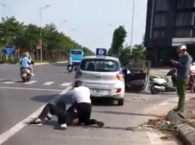 Image: Vietnamese police captain disciplined for not helping resident seize robber