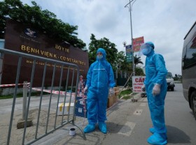 Image: Local coronavirus infections surge after public holiday in Vietnam