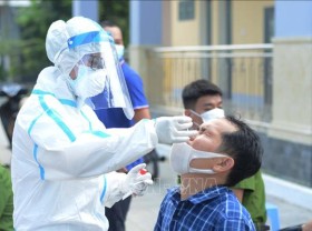 Image: Vietnam’s Covid-19 infections jump by 31
