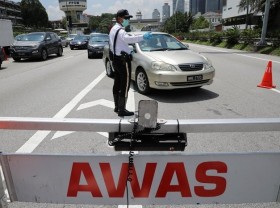 Image: Malaysia declares nationwide lockdown as COVID-19 cases spike