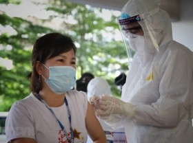 Image: 30,000 workers from virus-hit Bac Giang to return home