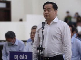 Image: Former top cop charged for involvement in Vu Nhom’s bribery
