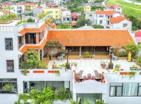 Image: On the top of a residence in Hanoi, a 100-year-old house