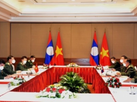 Image: Vietnam Laos discuss to promote mutual support and cooperation for defense