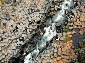 Image: Impressive stone blocks across Jrai Pha stream in Gia Lai