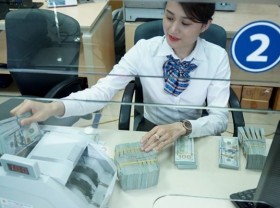 Image: First-half remittances to HCMC surge 22.34% despite Covid-19