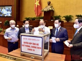 Image: NA deputies donate to COVID-19 prevention and control fund