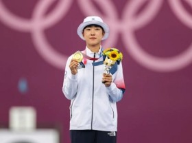 Image: Olympics: ROK archer An San secures historic third gold in Tokyo