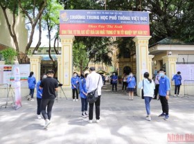 Image: Students sit national high school graduation exams