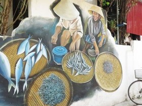 Image: Colourful mural paintings in fishing village