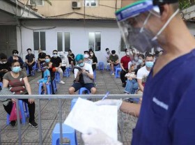 Image: Vietnam’s Covid-19 caseload jumps by 909