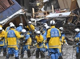 Image: Eighty missing after Japan landslide, search races time, weather