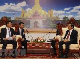 Image: Vietnam, Laos seek to beef up trade, industry and justice ties
