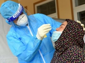 Image: Vietnam logs additional 10,280 COVID-19 cases
