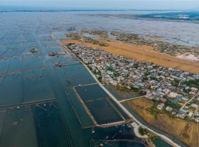 Image: Tranquil village by largest brackish lagoon in Southeast Asia