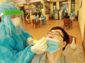 Image: Vietnam's daily spike of Covid-19 cases jumps to over 10,600
