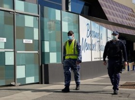 Image: Australia daily COVID-19 at 2021 record high with millions in lockdown