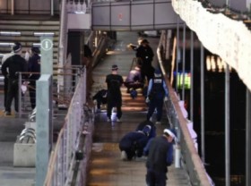 Image: Japanese police hand over body of murdered victim to Vietnamese side