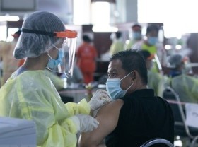 Image: Laos logs 207 new cases of COVID-19, 15 more provinces in Cambodia apply social distancing
