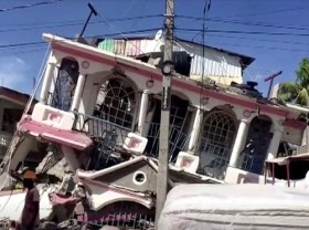 Image: Rescuers race to find Haiti quake survivors as death toll hits 1,297