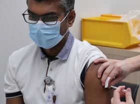Image: Singapore fully vaccinates 80% of population against COVID-19