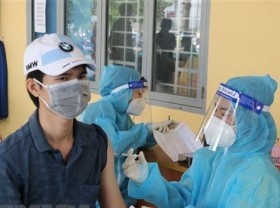 Image: Vietnam, China exchange pandemic prevention experience