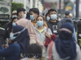 Image: Indonesian President calls on people to prepare to live with COVID-19