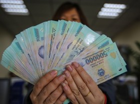 Image: State Treasury purchases US$150 million from commercial banks