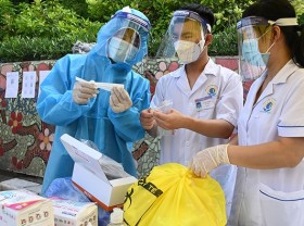 Image: Vietnam reports 7,646 new COVID-19 cases on Nov. 7