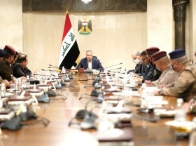 Image: Iraqi PM decries 'cowardly' attack on his home by drones carrying explosives
