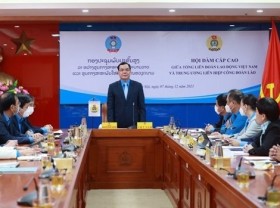 Image: Vietnam, Laos forge trade union cooperation